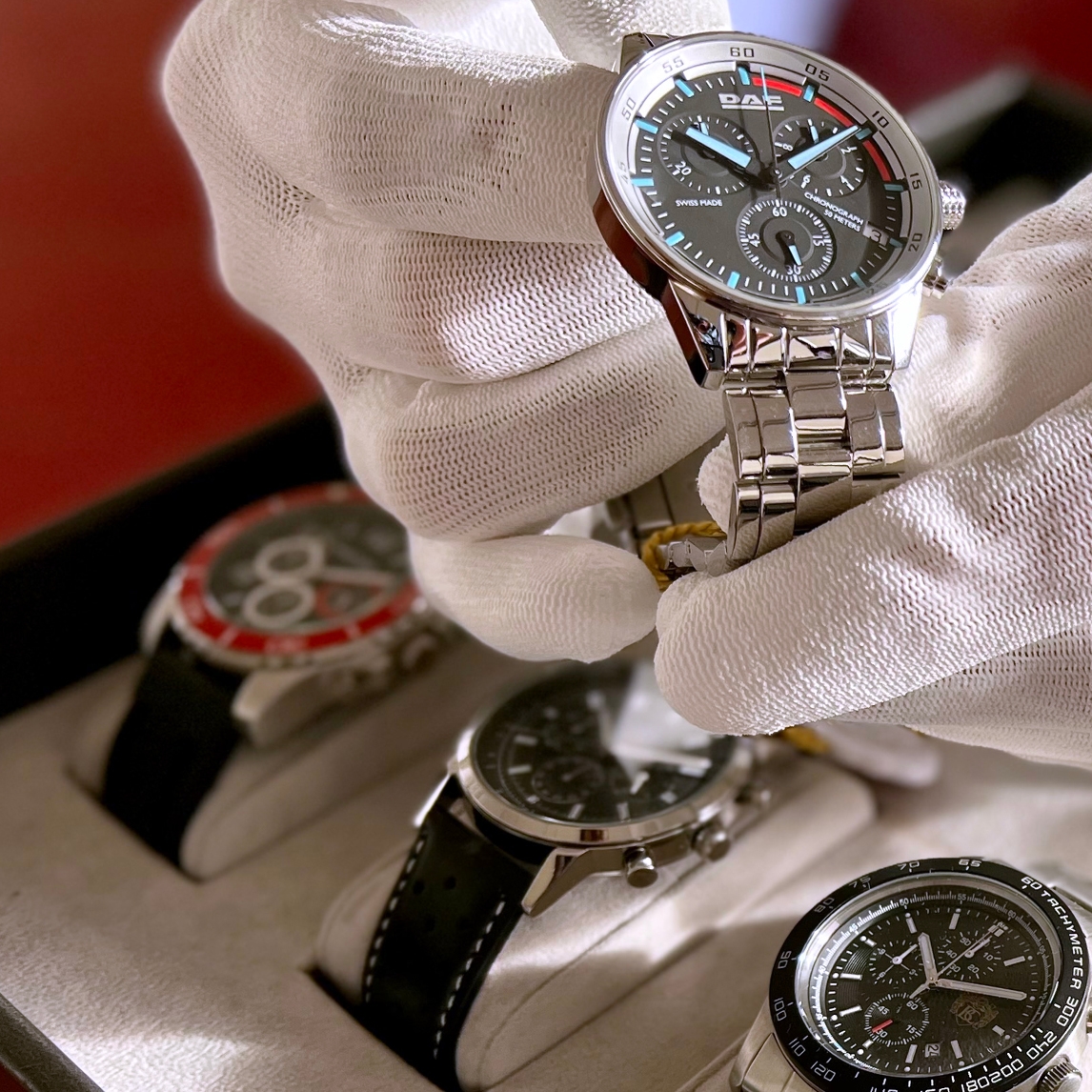 Hands-on review of different custom logo watch styles during a Watch Branding consultation.